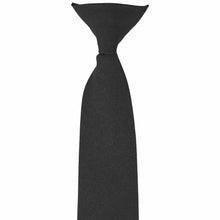 Load image into Gallery viewer, The front of a knot on a black clip-on uniform tie