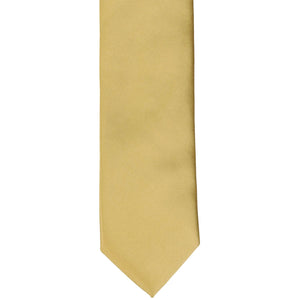 The front of a boys' light gold tie, laid out flat