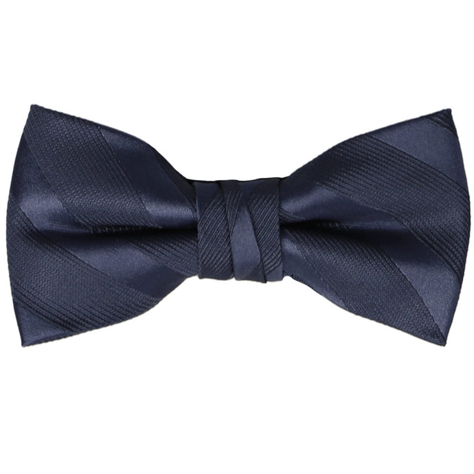 A boys' navy blue bow tie with tone-on-tone textured stripes