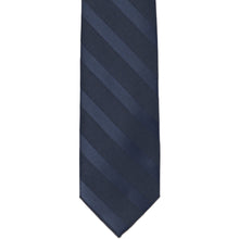Load image into Gallery viewer, The front of a boys tone-on-tone striped tie in navy blue, laid flat