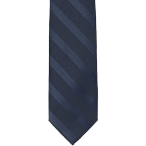 The front of a boys tone-on-tone striped tie in navy blue, laid flat