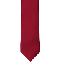 Load image into Gallery viewer, The front of a burgundy silk slim tie, laid out flat
