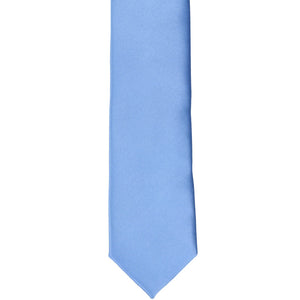 The front of a cornflower skinny tie, laid out flat