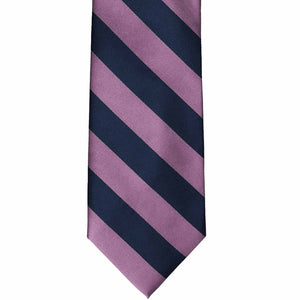 The front of a dusty purple and navy striped tie