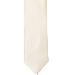 The front of an ivory silk slim tie, laid out flat