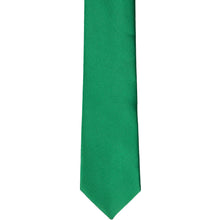 Load image into Gallery viewer, The front of a kelly green skinny tie, laid flat