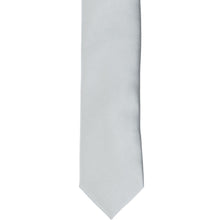 Load image into Gallery viewer, The front of a light silver skinny tie, laid flat