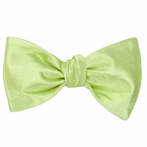 Lime green self-tie bow tie, tied