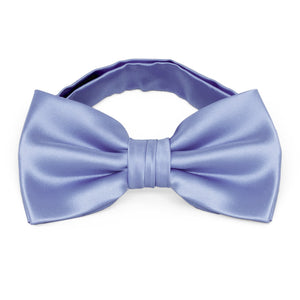 A periwinkle solid color bow tie with a pre-tied band collar