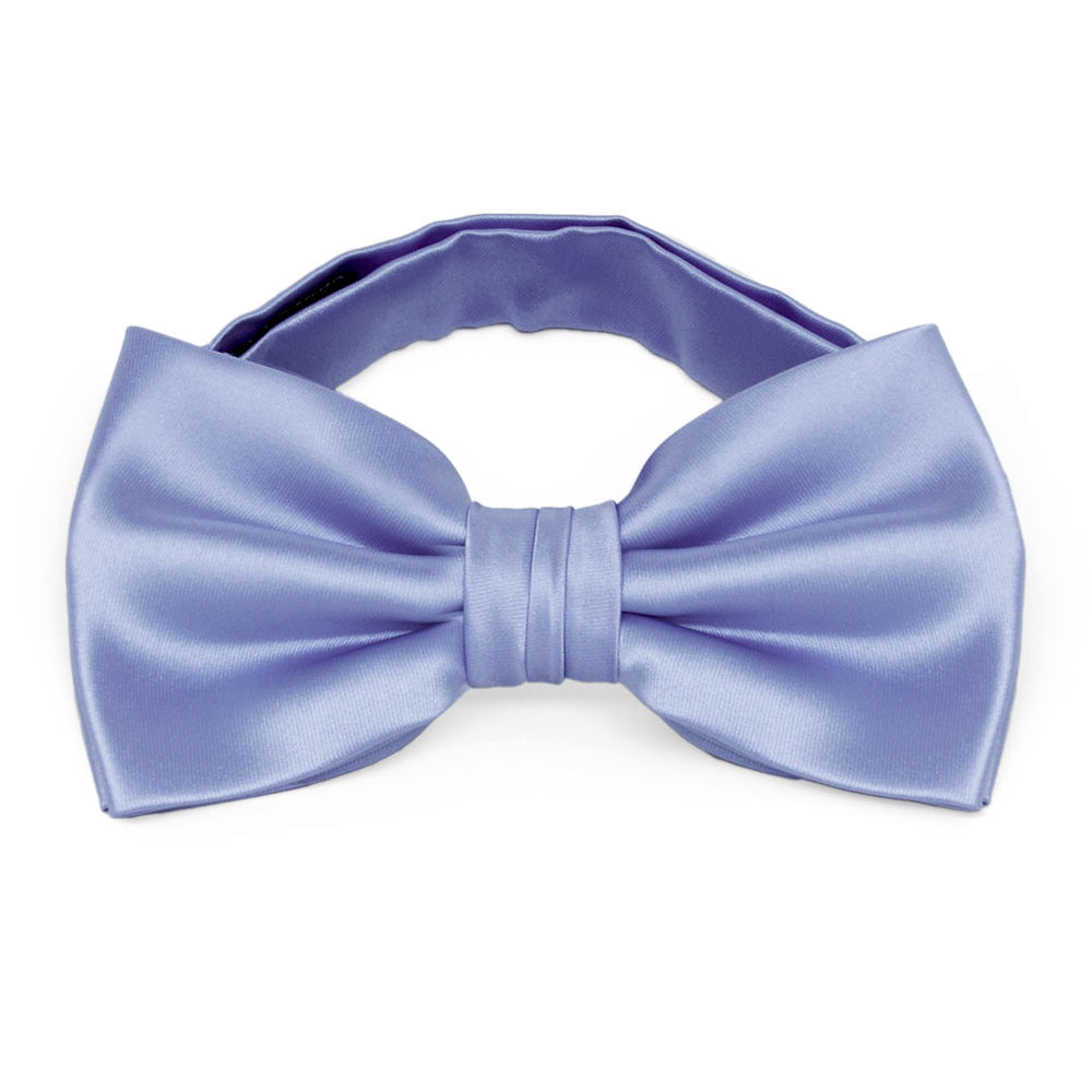 A periwinkle solid color bow tie with a pre-tied band collar