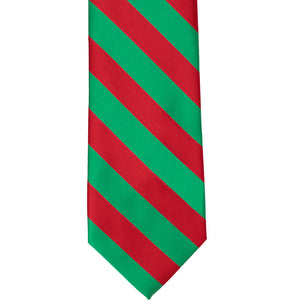 The front of a red and green striped tie, laid out flat