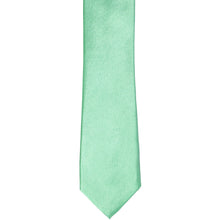 Load image into Gallery viewer, The front of a seafoam skinny tie, laid flat