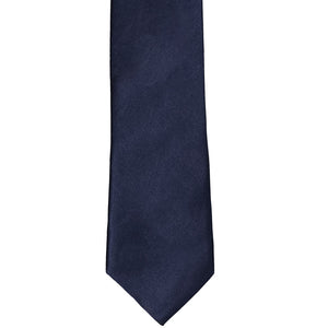The front of a twilight blue slim tie, laid flat