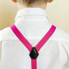 Load image into Gallery viewer, The back of a boy wearing bright fuchsia suspenders with a white dress shirt