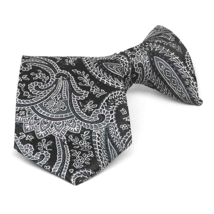 Boys' black and silver paisley clip-on tie, folded front view