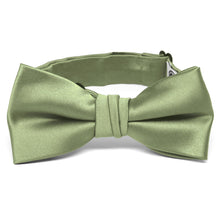 Load image into Gallery viewer, A child-size sage green bow tie in a pre-tied band collar style