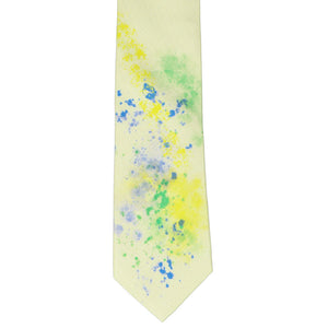 Flat view of a boys' yellow tie with colorful art stains