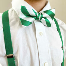 Load image into Gallery viewer, A boy wearing green suspenders with a green and white striped bow tie and white dress shirt