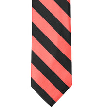 Load image into Gallery viewer, The front of a bright coral and black striped tie, laid out flat
