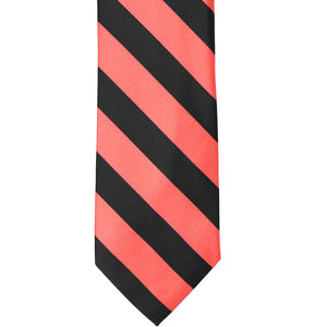 The front of a bright coral and black striped tie, laid out flat