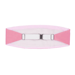 The back of a bright pink cummerbund, including the white elastic strap