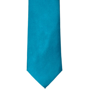 The front of a caribbean blue solid tie, laid out flat