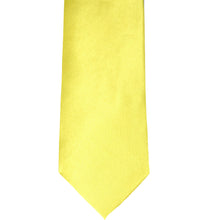 Load image into Gallery viewer, The front of a daffodil yellow solid tie, laid out flat