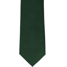 Load image into Gallery viewer, The front of a forest green herringbone tie, laid out flat