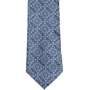 Flat front view of a blue and white floral pattern necktie