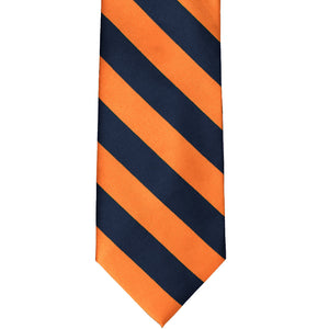 Front flat view of a navy blue and orange striped tie