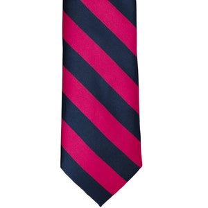 The front of a fuchsia and navy blue striped tie, laid out flat