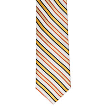Load image into Gallery viewer, Bottom front view of an orange and white striped slim tie