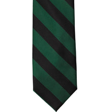 Load image into Gallery viewer, The front of a hunter green and black striped tie, laid out flat