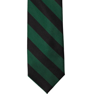 The front of a hunter green and black striped tie, laid out flat