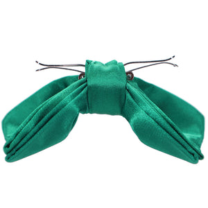 The side view of an opened jade clip-on bow tie