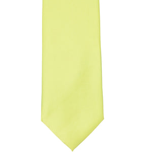 The front of a lemon lime solid tie, laid out flat