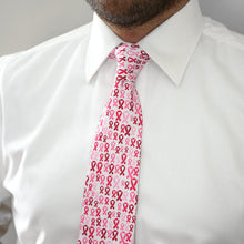 Load image into Gallery viewer, Man wearing a pink ribbon pattern tie and white dress shirt