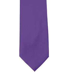 The front of a medium purple tie, laid out flat