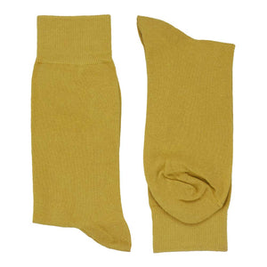Men's gold dress socks folded flat