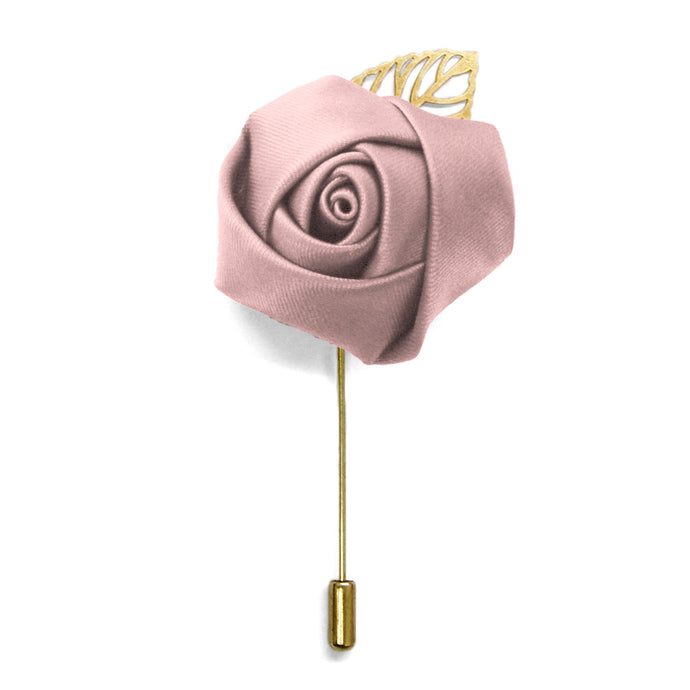 A mauve colored flower lapel pin with a gold leaf and metal pin