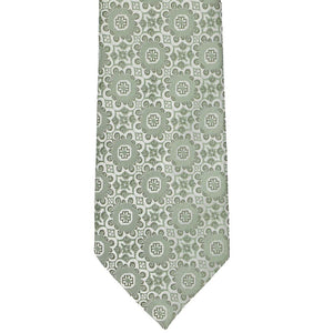 The front of a mint green abstract floral pattern tie