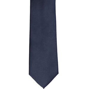 The front of a solid navy tie in a narrow width