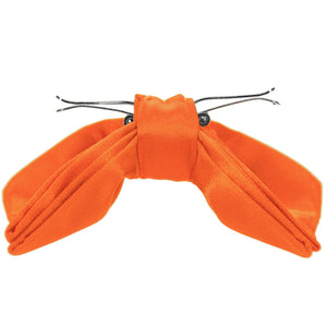 A neon orange clip-on bow tie, opened to show the clips