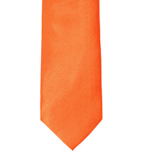 Load image into Gallery viewer, The front of a neon orange solid tie, laid out flat