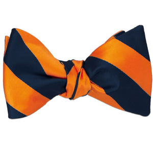 Orange and navy blue striped self-tie bow tie, tied