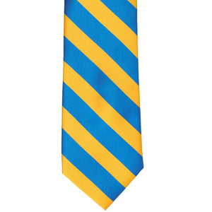 The front of a golden yellow and peacock blue striped tie, laid flat