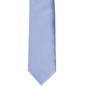 The front of a periwinkle slim tie, laid out flat