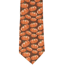 Load image into Gallery viewer, Flat front view of a brown and orange scattered pumpkin necktie