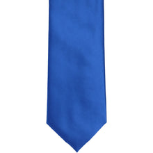 Load image into Gallery viewer, The front of a royal blue solid tie, laid out flat