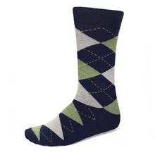 Load image into Gallery viewer, A single navy blue and sage argyle sock